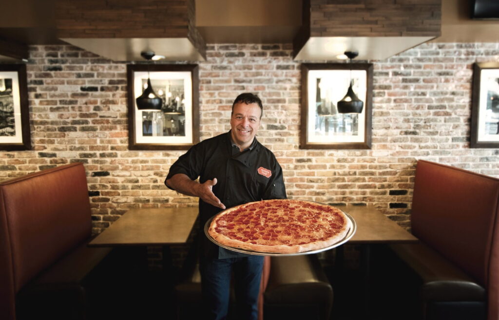 Chef Anthony Russo with Giant Pizza